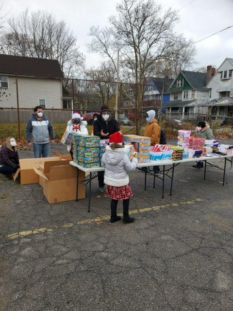 Volunteers and children at the Greater Mt. Olivet holiday toy giveaway