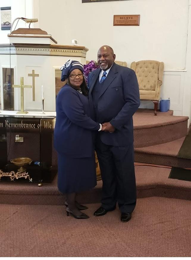 Pastor Rollins and First Lady Diane Rollins at the altar
